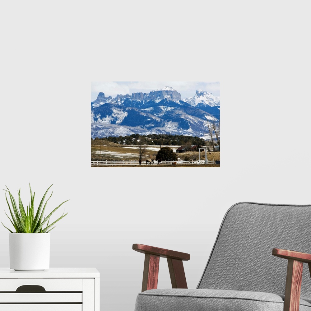 A modern room featuring A ranch below peaks of the San Juan Mountains, Colorado