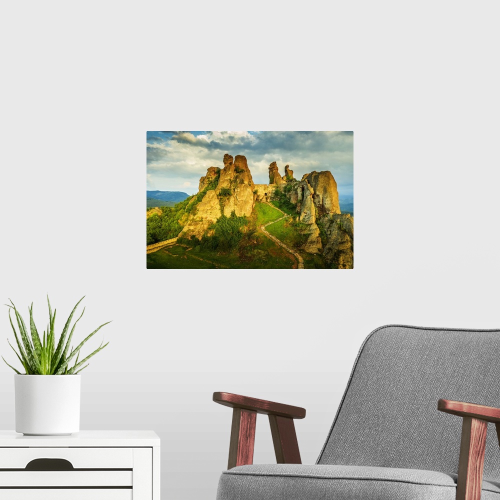 A modern room featuring Aerial view by drone of Kaleto Rock Fortress rock formations, Belogradchik, Bulgaria, Europe