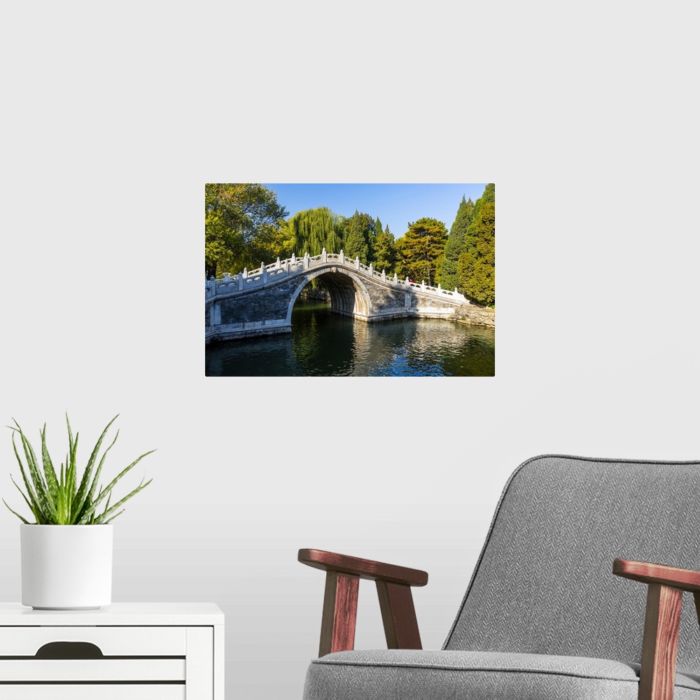 A modern room featuring View of arched bridge on Kunming Lake at Yihe Yuan, The Summer Palace, UNESCO World Heritage Site...