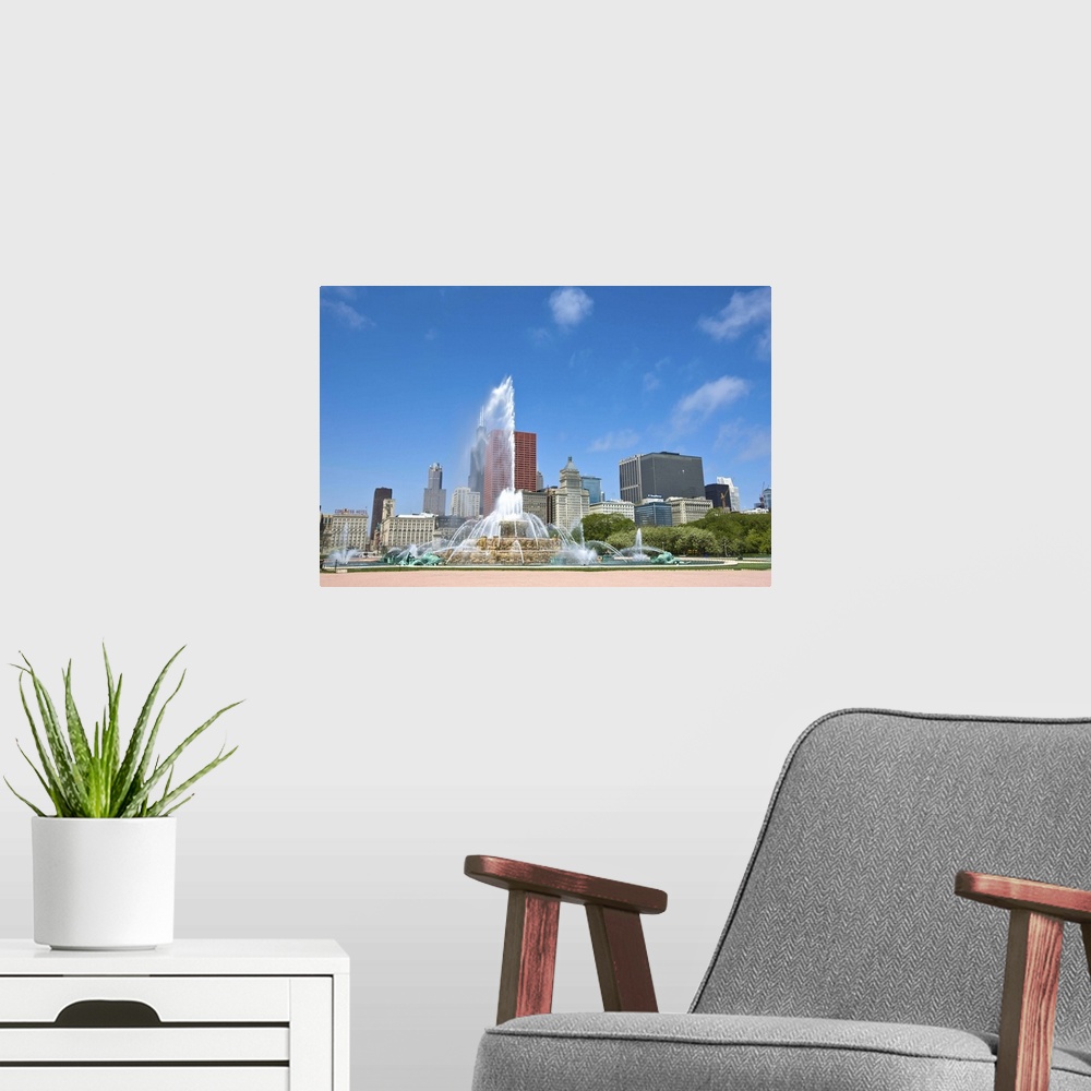 A modern room featuring Buckingham Fountain in Grant Park with skyline beyond, Chicago, Illinois, USA