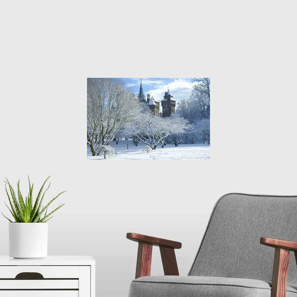 A modern room featuring Cardiff Castle in snow, Bute Park, South Wales, Wales, UK