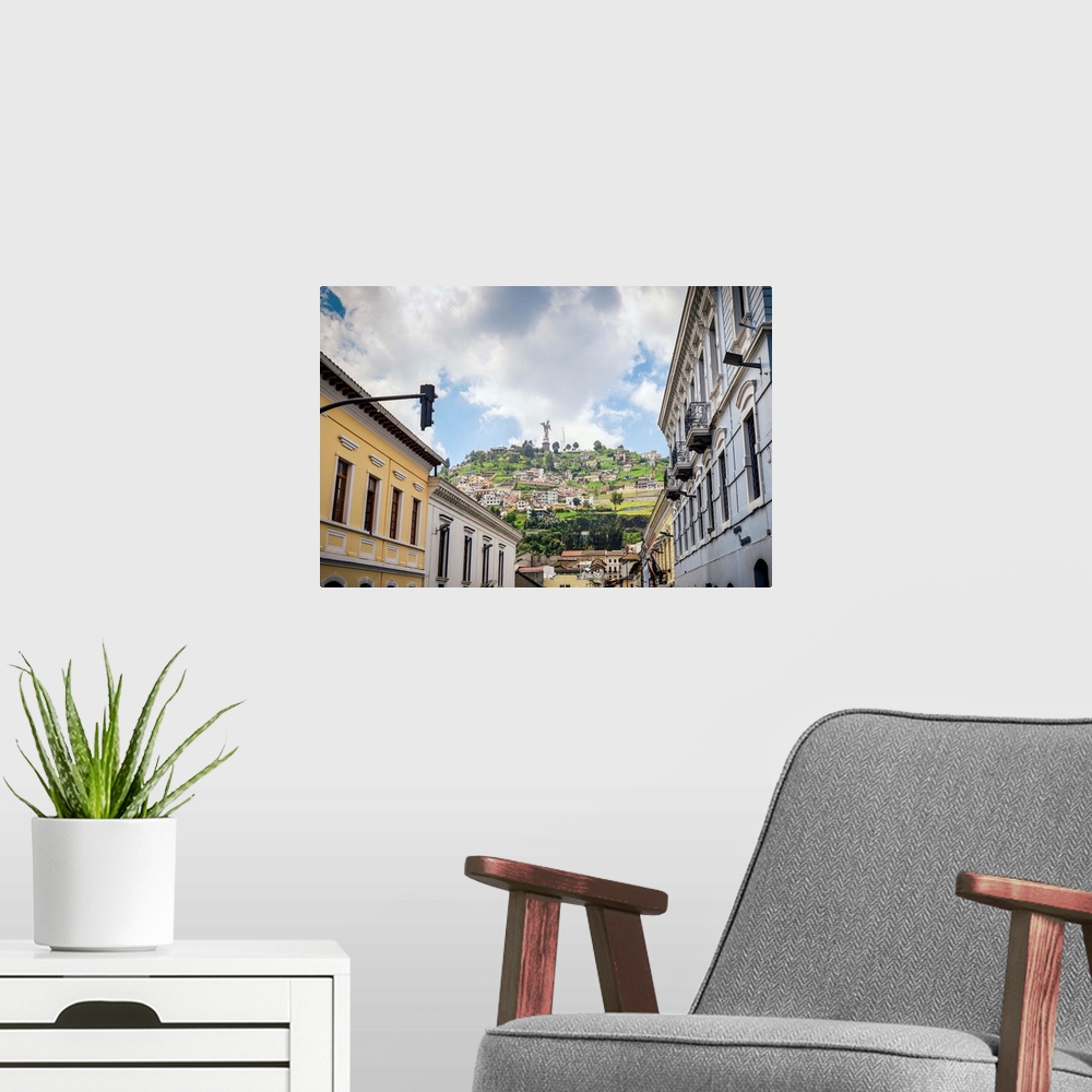 A modern room featuring Cityscape with the Panecillo in the background, Quito, Ecuador