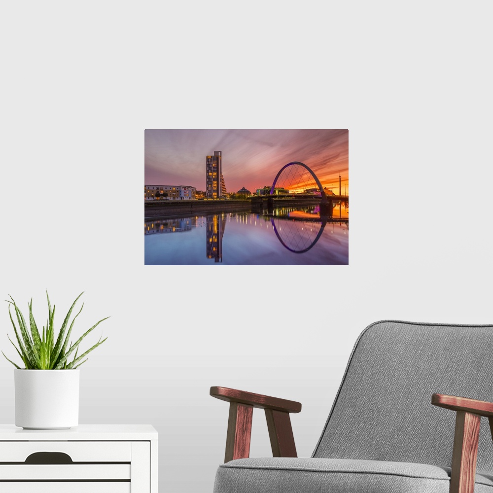 A modern room featuring Clyde Arc (Squinty Bridge) at sunset, River Clyde, Glasgow, Scotland, United Kingdom, Europe