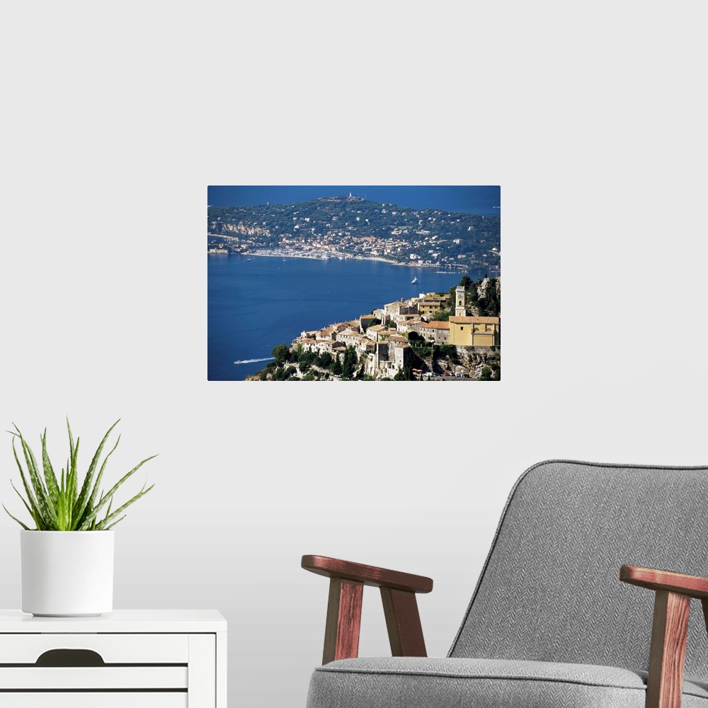 A modern room featuring Eze village and Cap Ferrat in background, Provence, French Riviera, France