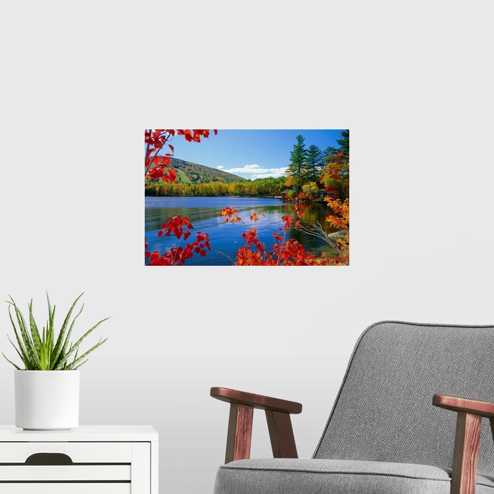 A modern room featuring Fall colours, Moose Pond, with Mount Pleasant in the background, Maine, New England