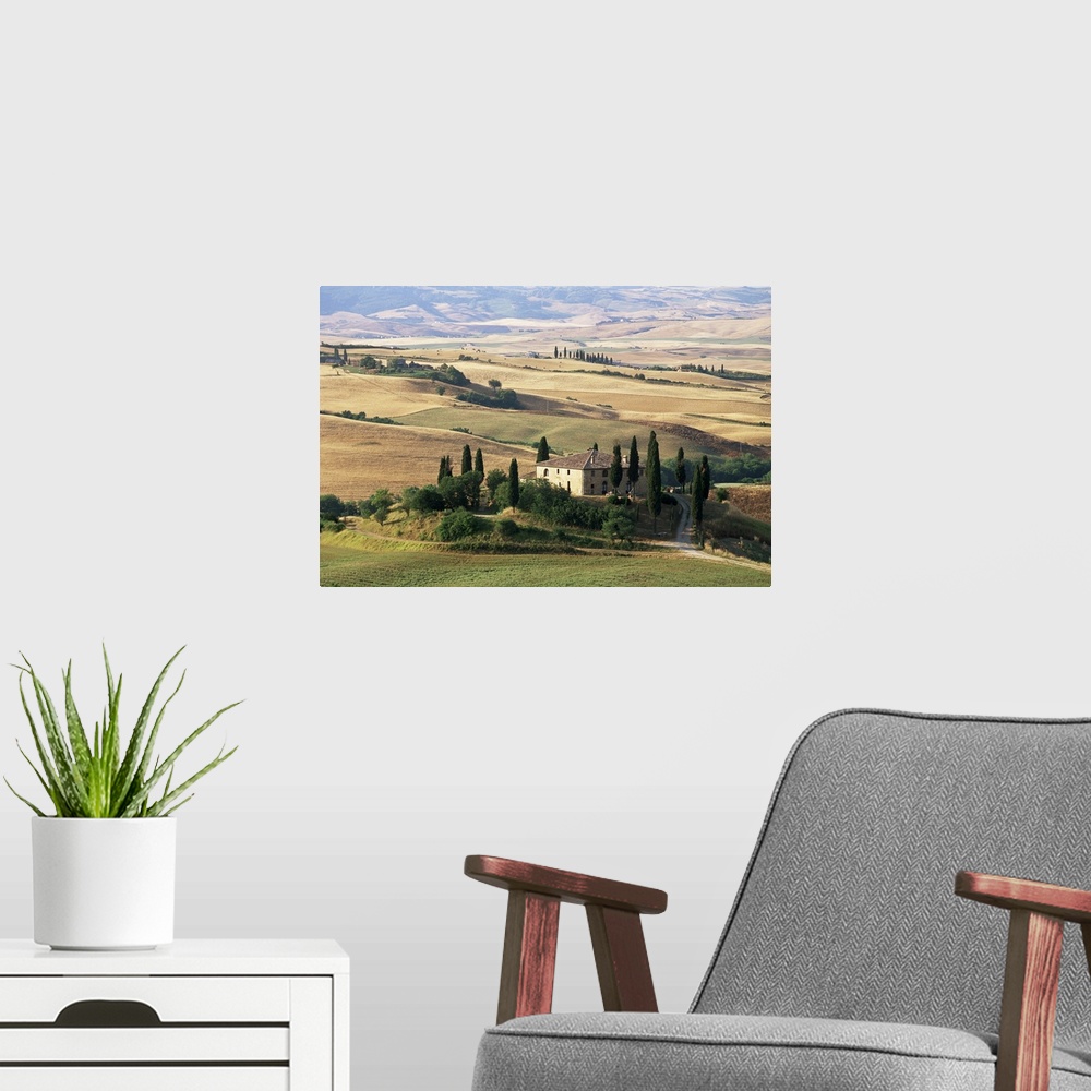 A modern room featuring Farmhouse and cypress trees in the early morning, San Quirico d'Orcia, Tuscany, Italy