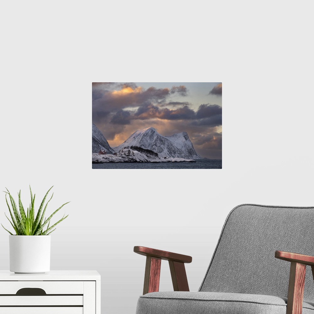 A modern room featuring View of Hamn and Teistevika at sunset backed by Indre Teisten mountain, Hamn, Senja, Troms og Fin...