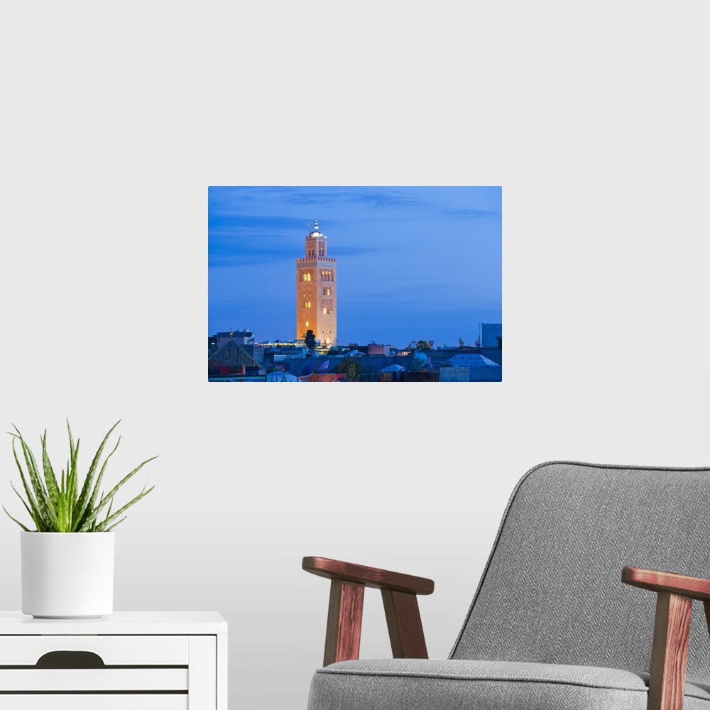A modern room featuring Koutoubia Mosque minaret at night, Marrakech, Morocco, North Africa, Africa