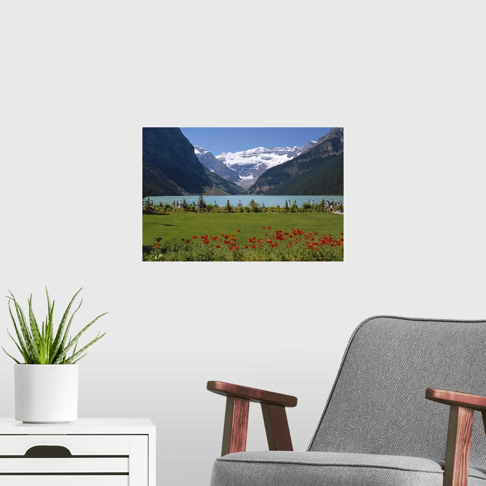 A modern room featuring Lake Louise with the Rocky Mountains in the background, in Alberta, Canada