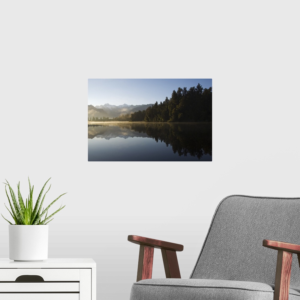A modern room featuring Lake Matheson reflecting Mount Tasman and Aoraki, South Island New Zealand