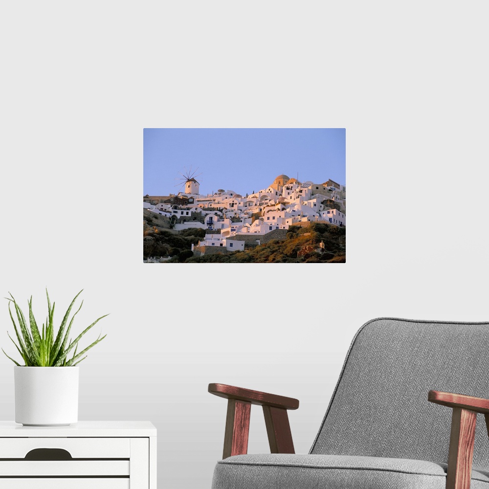 A modern room featuring Oia (Ia), island of Santorini (Thira), Cyclades Islands, Aegean, Greek Islands, Greece