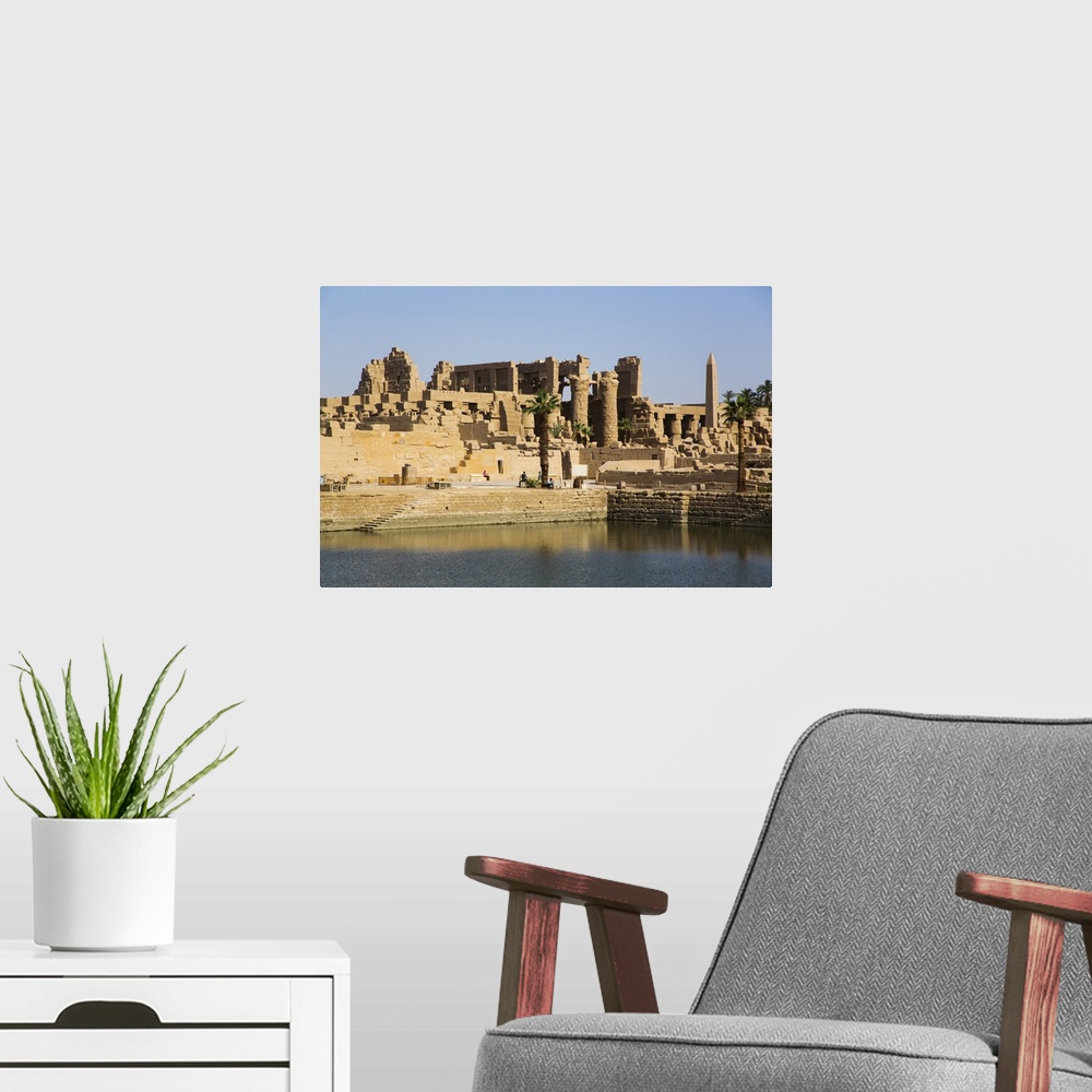 A modern room featuring Sacred Lake, Karnak Temple Complex, UNESCO World Heritage Site, Luxor, Thebes, Egypt, North Afric...