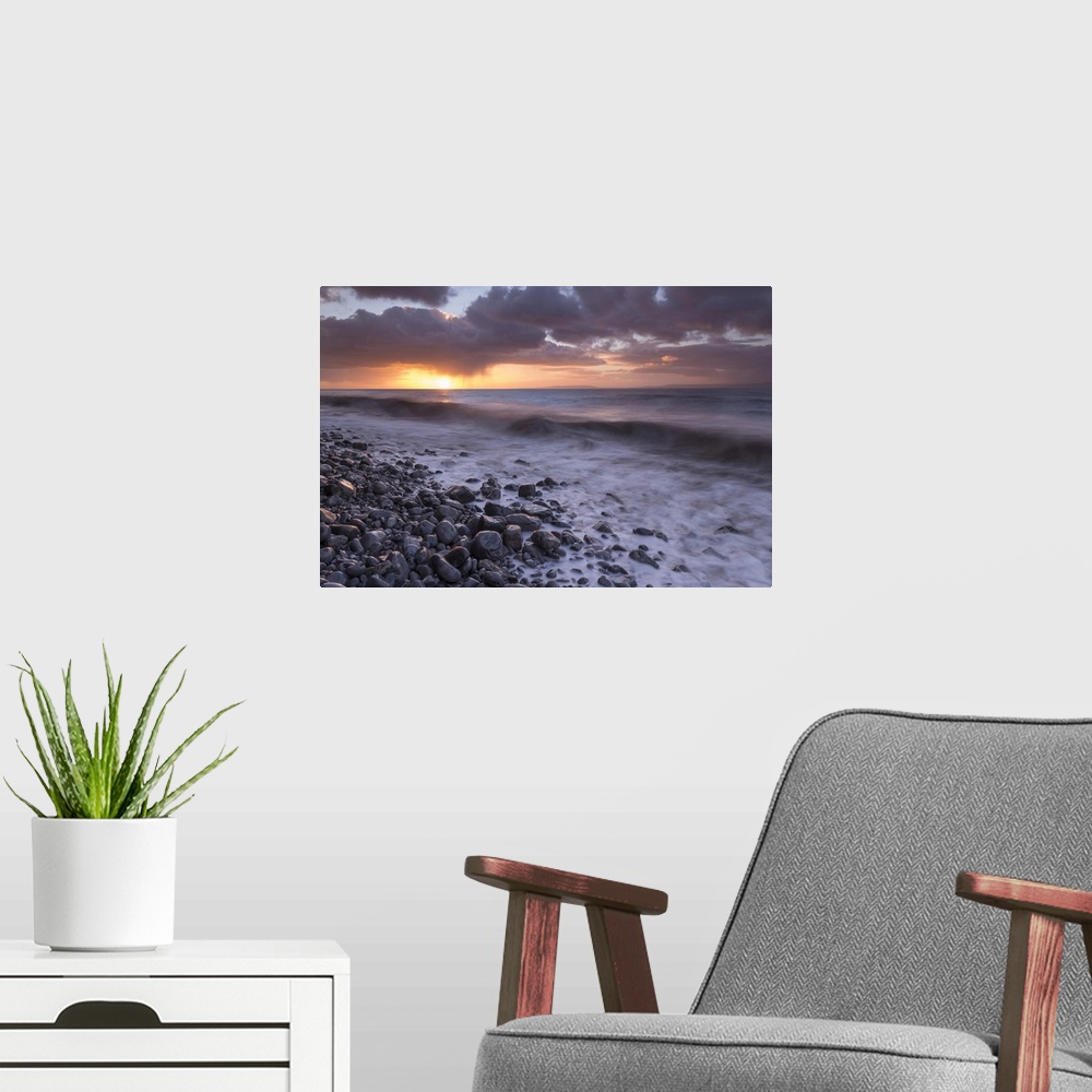 A modern room featuring Sunrise over the sea at Llantwit Major in winter, Glamorgan, Wales, United Kingdom, Europe