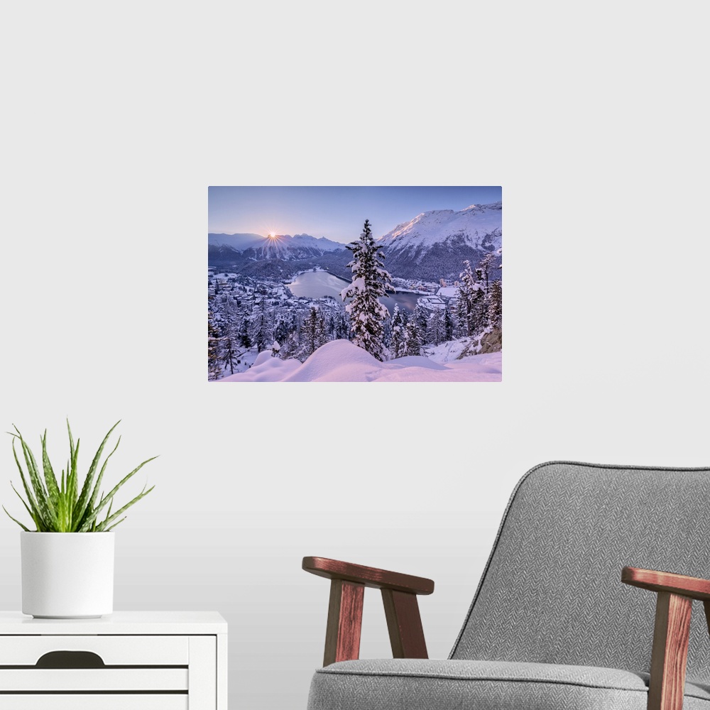 A modern room featuring Sunrise over village and Lake of St. Moritz covered with snow, Engadine, Canton of Graubunden, Sw...