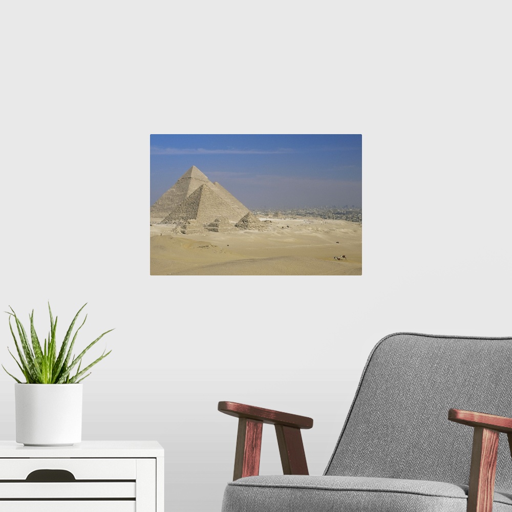 A modern room featuring The Pyramids, Giza, with Cairo beyond, Egypt, North Africa