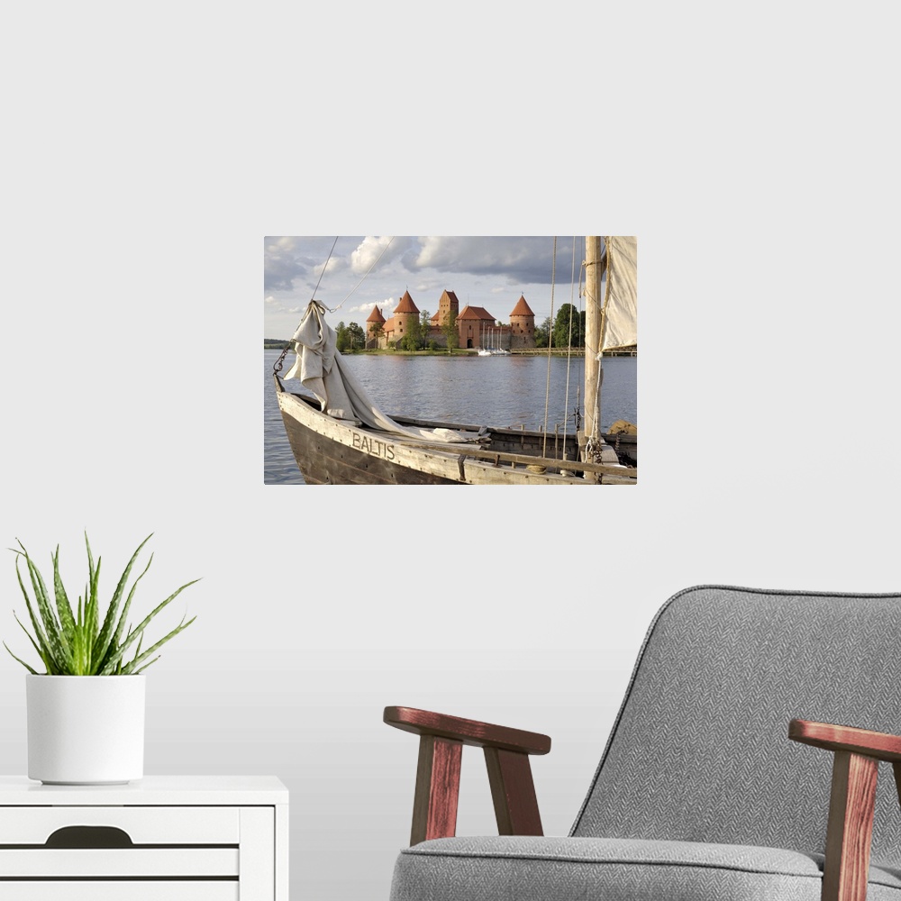 A modern room featuring Traditional boat and Trakai Castle, Trakai, near Vilnius, Lithuania, Baltic States