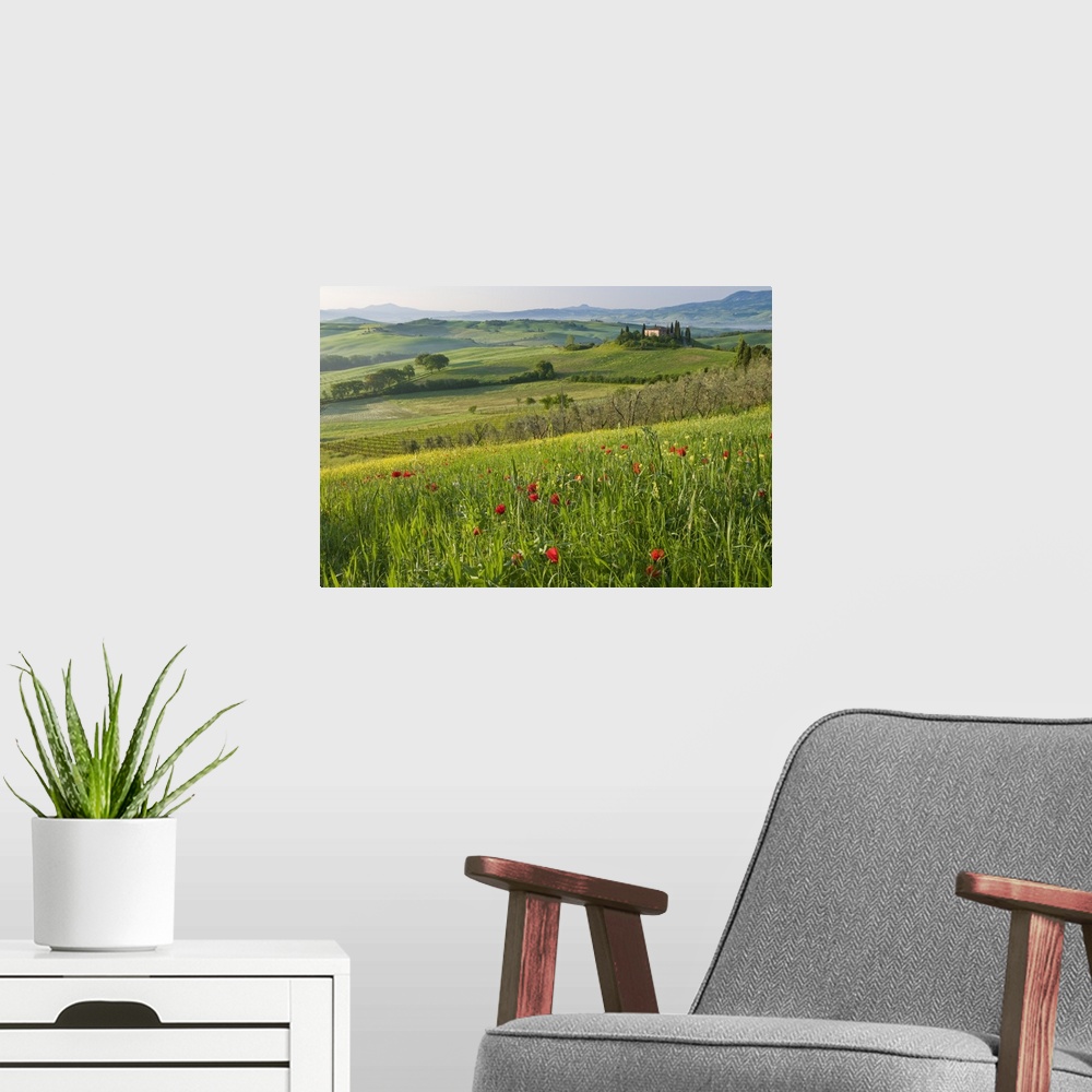 A modern room featuring Val d'Orcia showing Belvedere and rolling Tuscan countryside, Tuscany, Italy