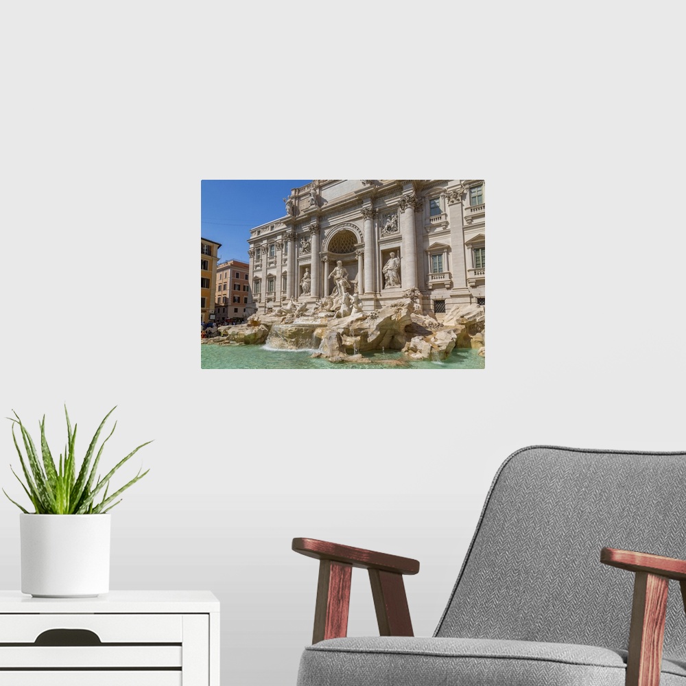 A modern room featuring View of Trevi Fountain in bright sunlight, Piazza di Trevi, UNESCO World Heritage Site, Rome, Laz...