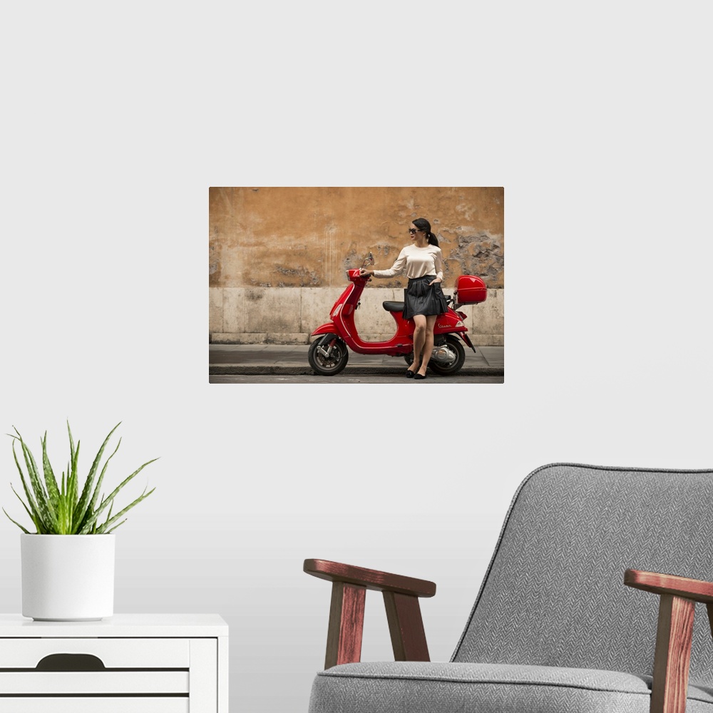 A modern room featuring Young woman waiting by Vespa moped, Rome, Lazio, Italy, Europe