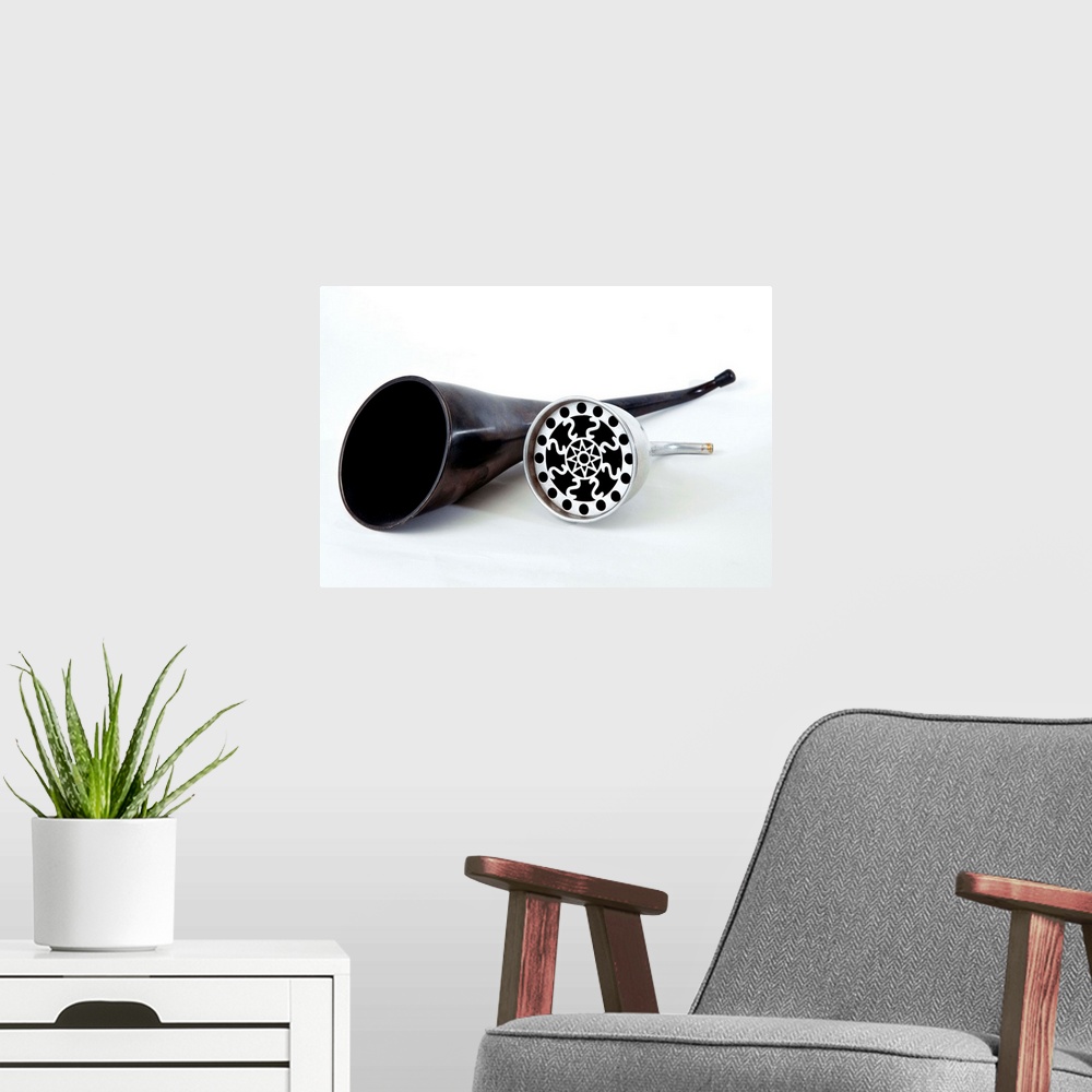 A modern room featuring Ear trumpets. These historical device were designed to help the hard of hearing. The earpieces ar...
