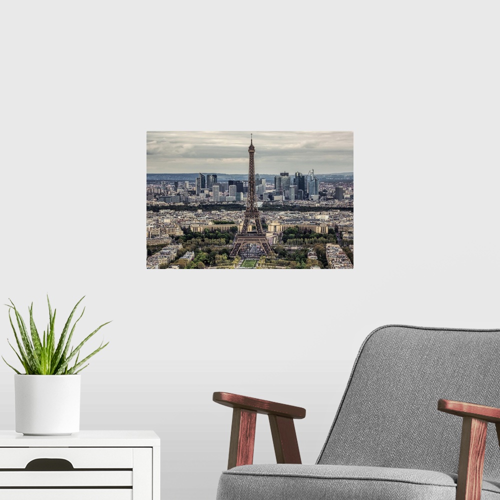 A modern room featuring Aerial view of the Eiffel Tower and La Defense in Paris