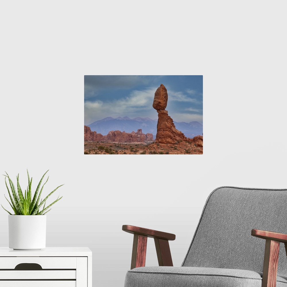 A modern room featuring Balanced Rock in Arches National Park