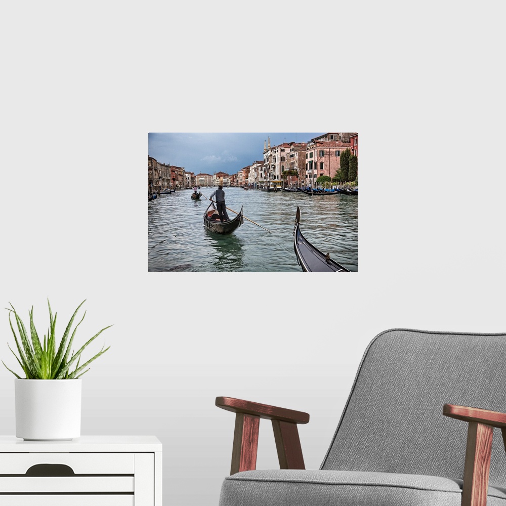 A modern room featuring Gondolas at sunset in Venice, Italy.