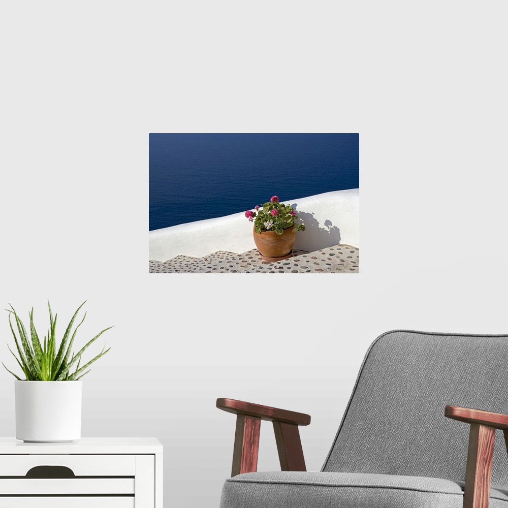 A modern room featuring Greek Flowers over the sea