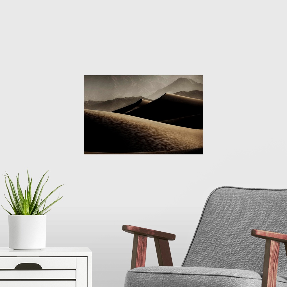 A modern room featuring Mesquite Sand dunes in Death Valley National Park at sunrise