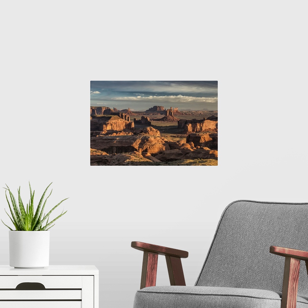 A modern room featuring Picturesque Hunts Mesa rock formation in Monument Valley, Utah