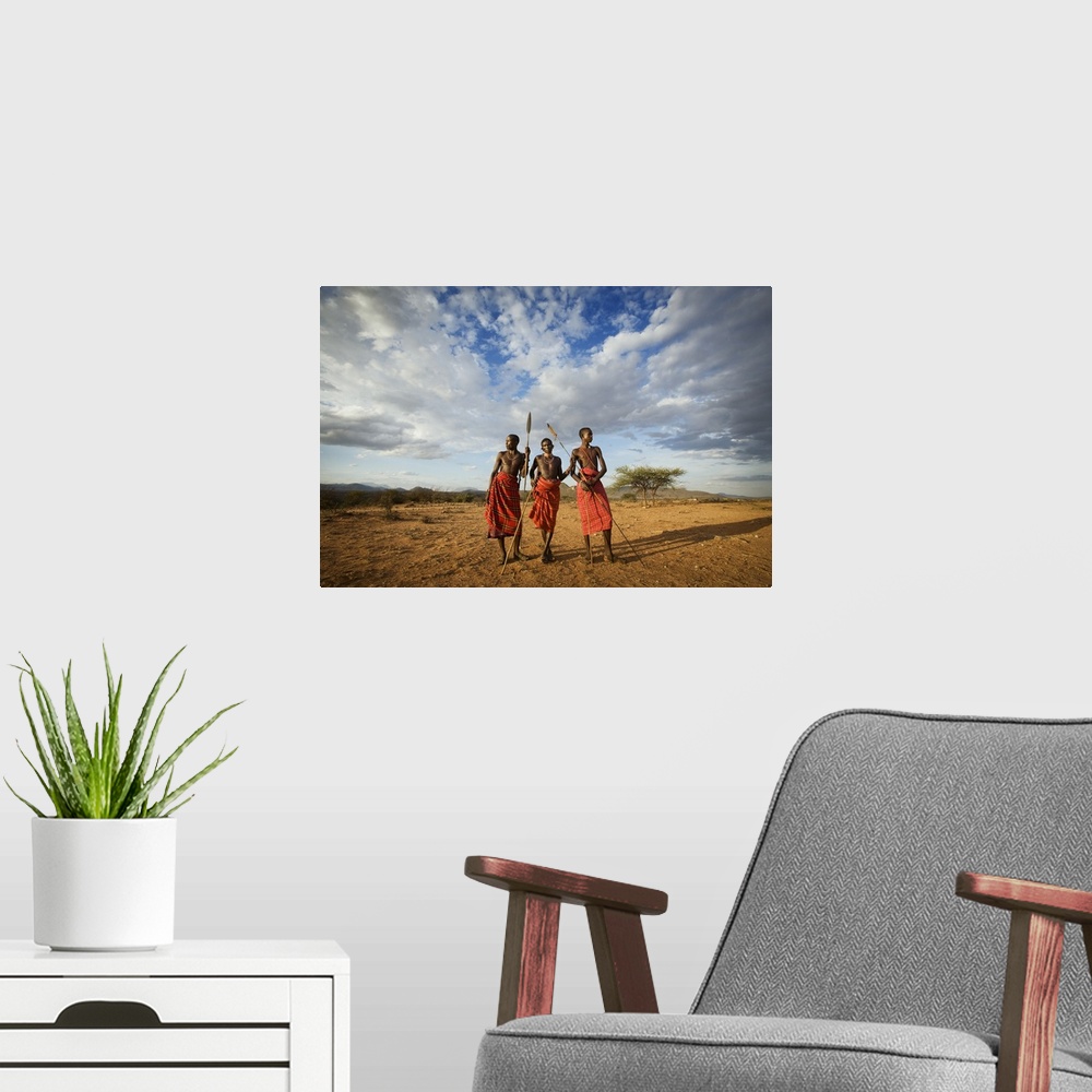 A modern room featuring Samburu tribe at sunset, Kenya, Africa