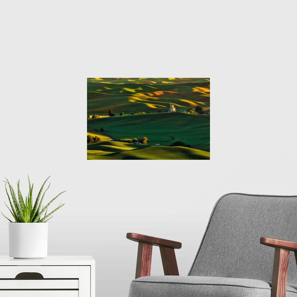 A modern room featuring Steptoe Butte in the Palouse at sunrise