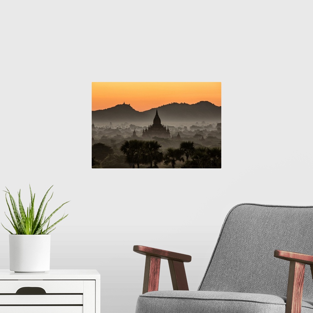 A modern room featuring Sunrise with temples in Bagan, Burma.