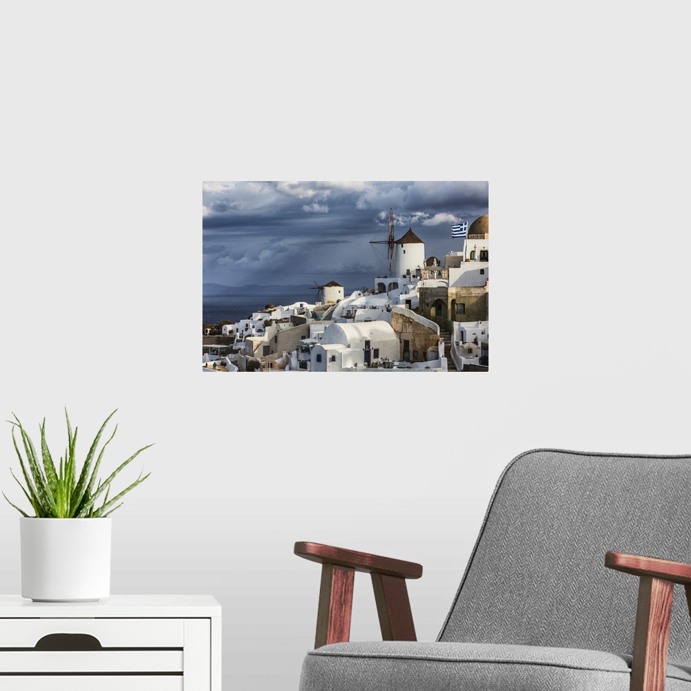 A modern room featuring Sunset at Oia, on the island of Santorini, Greece