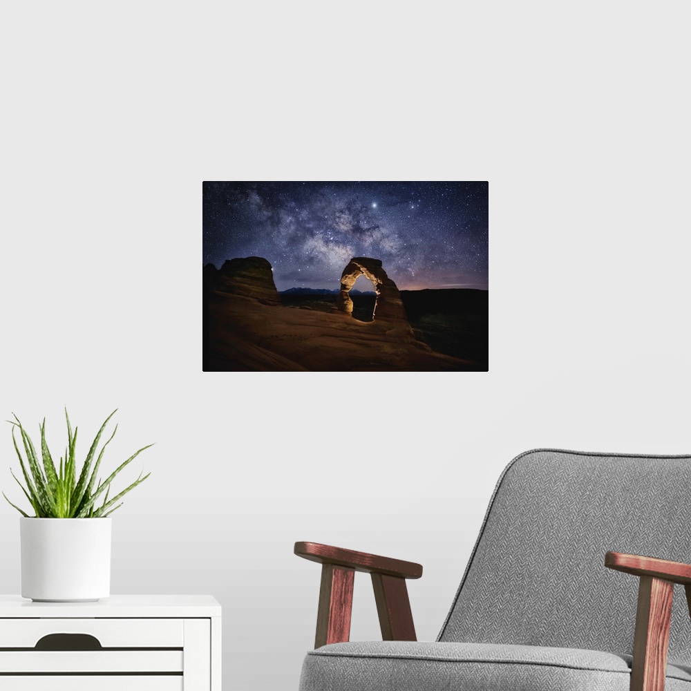 A modern room featuring The Milky Way over Delicate Arch in Arches National Park