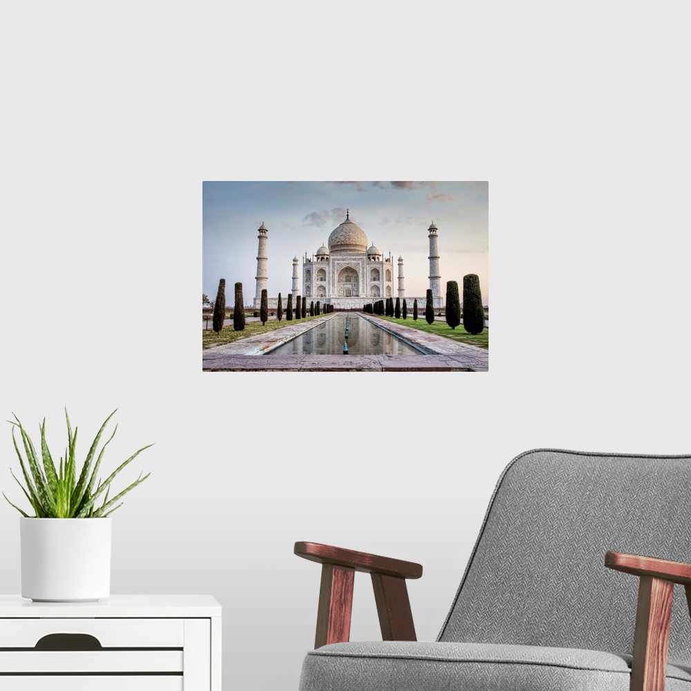 A modern room featuring The Taj Mahal at sunrise