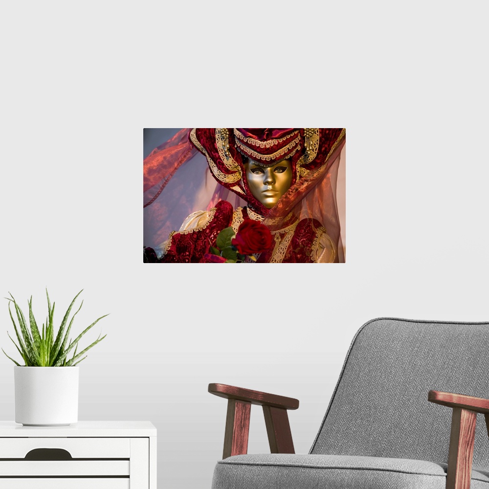 A modern room featuring Large photo on canvas of a woman dressed up wearing a smooth mask in Italy.