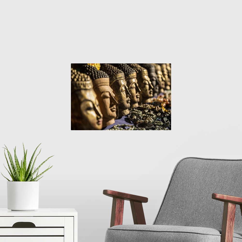 A modern room featuring Wooden buddha heads in Inle Lake, Burma