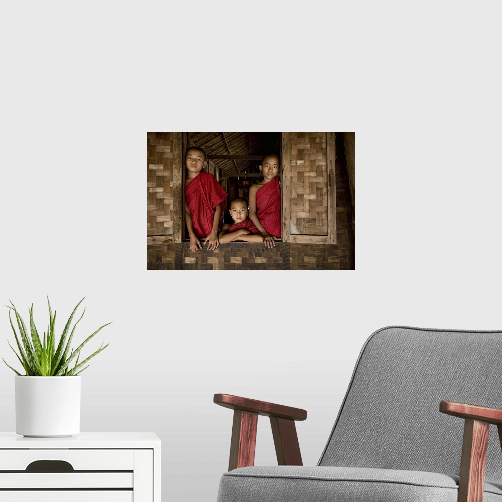 A modern room featuring Young Burmese monks in their monastery, Bagan, Burma