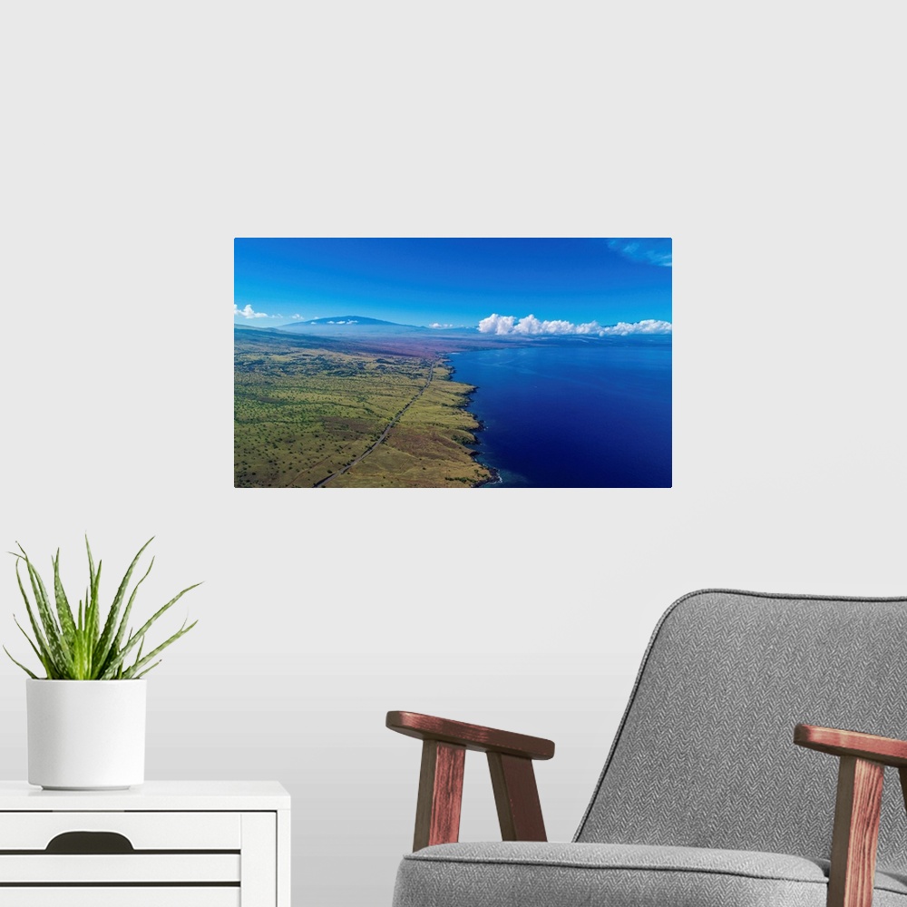 A modern room featuring Aerial photograph of the west shore of Kona Island, Hawaii