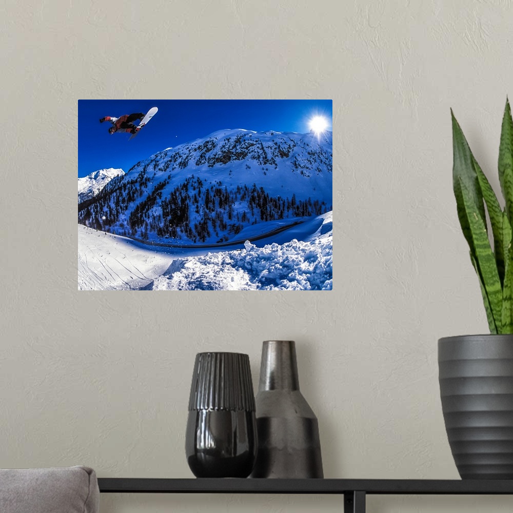 A modern room featuring Dave Aubrey flying over the Alps in Julier Pass, Switzerland.