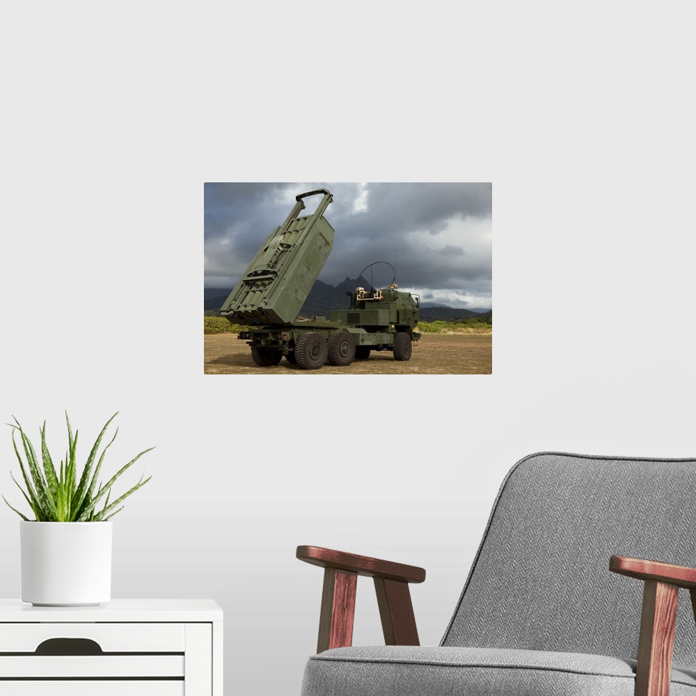 A modern room featuring A M142 High Mobility Artillery Rocket System (HIMARS) conducts dry fire exercises in support of i...