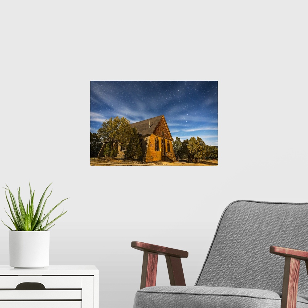 A modern room featuring January 27, 2015 - A moonlit nightscape of the historic Hearst Church in Pinos Altos, New Mexico,...