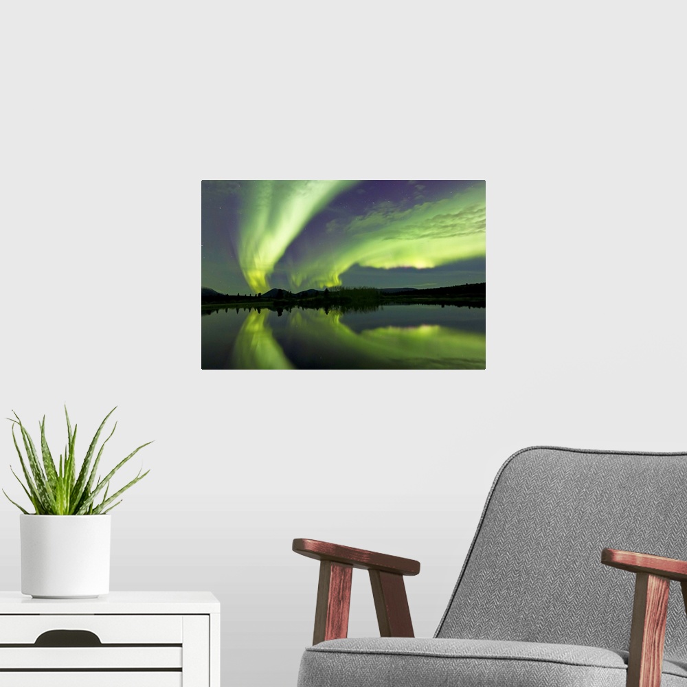 A modern room featuring Aurora borealis over Fish lake, Whitehorse, Yukon, Canada.