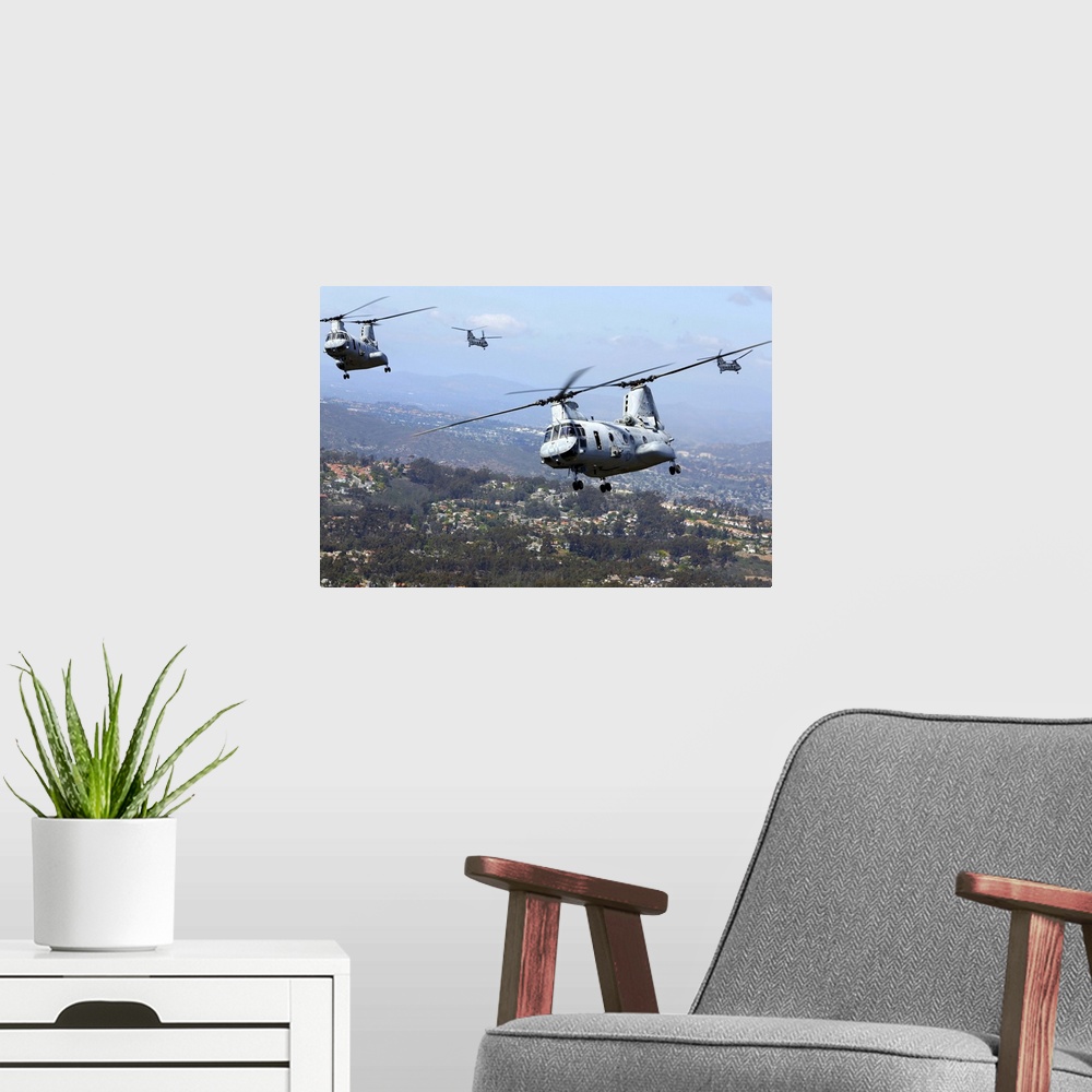 A modern room featuring March 31, 2014 - U.S. Marines fly CH-46E Sea Knight helicopters over San Diego, California.
