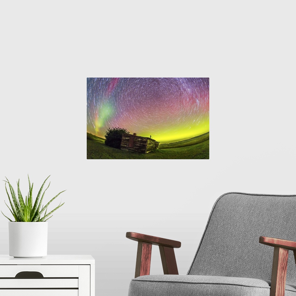 A modern room featuring August 27-28, 2014 - Fish-eye lens composite of aurora borealis and circumpolar star trails above...