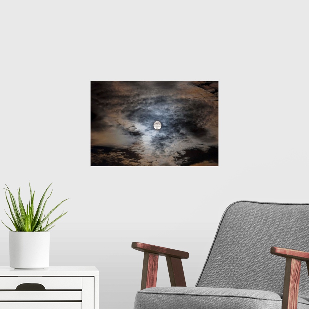 A modern room featuring August 28, 2007 - Full moon in clouds.