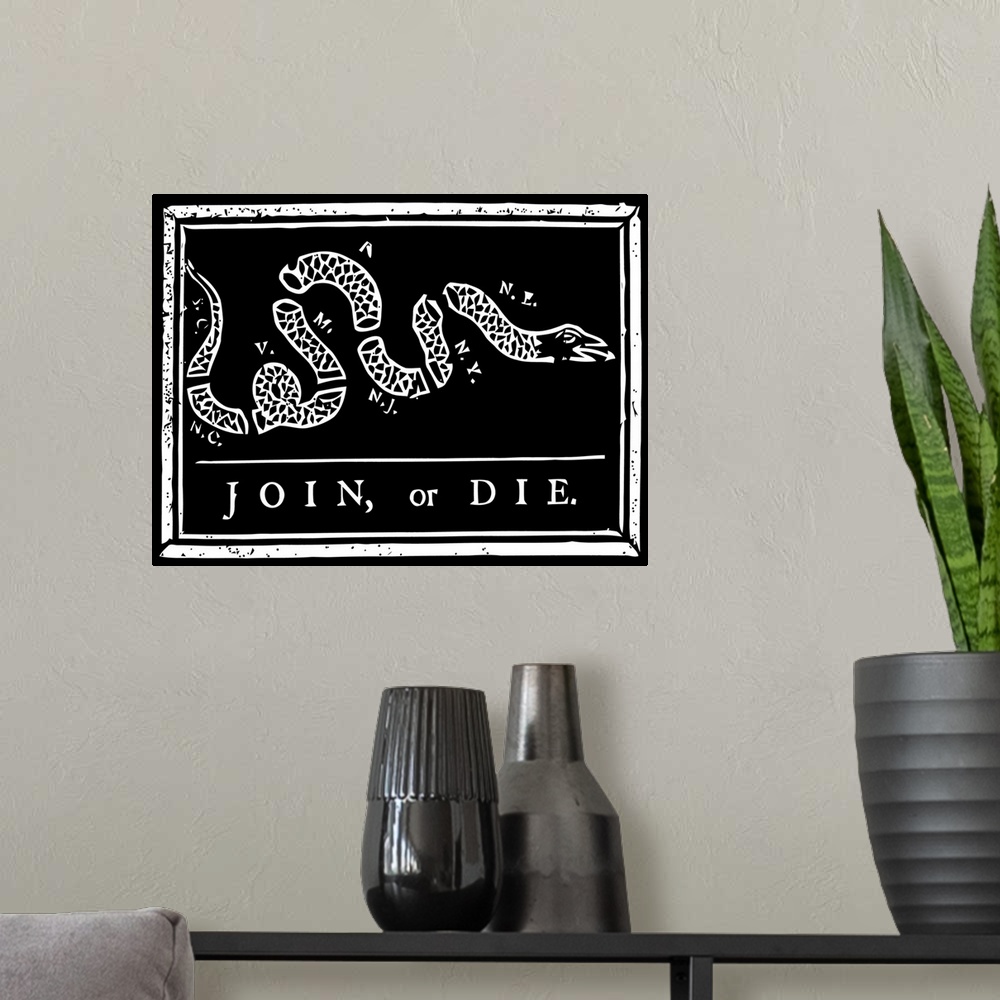 A modern room featuring The Join or Die print was a political cartoon created by Benjamin Franklin. The snake shown is se...