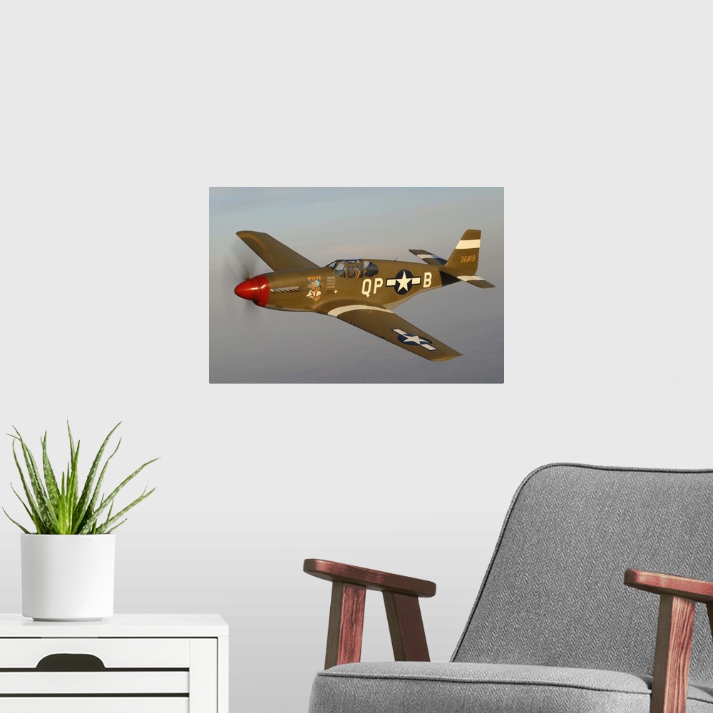 A modern room featuring P-51C Mustang flying over Chino, California.