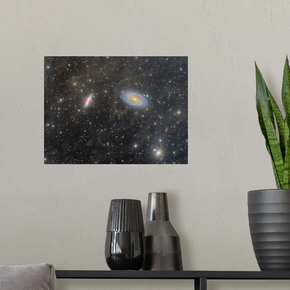 A modern room featuring The Cigar Galaxy and Bode's Galaxy.